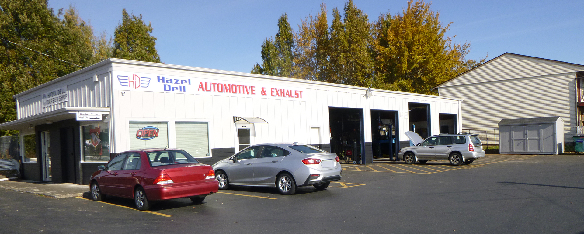 Hazel Dell Automotive & Exhaust || in front of the auto repair shop
